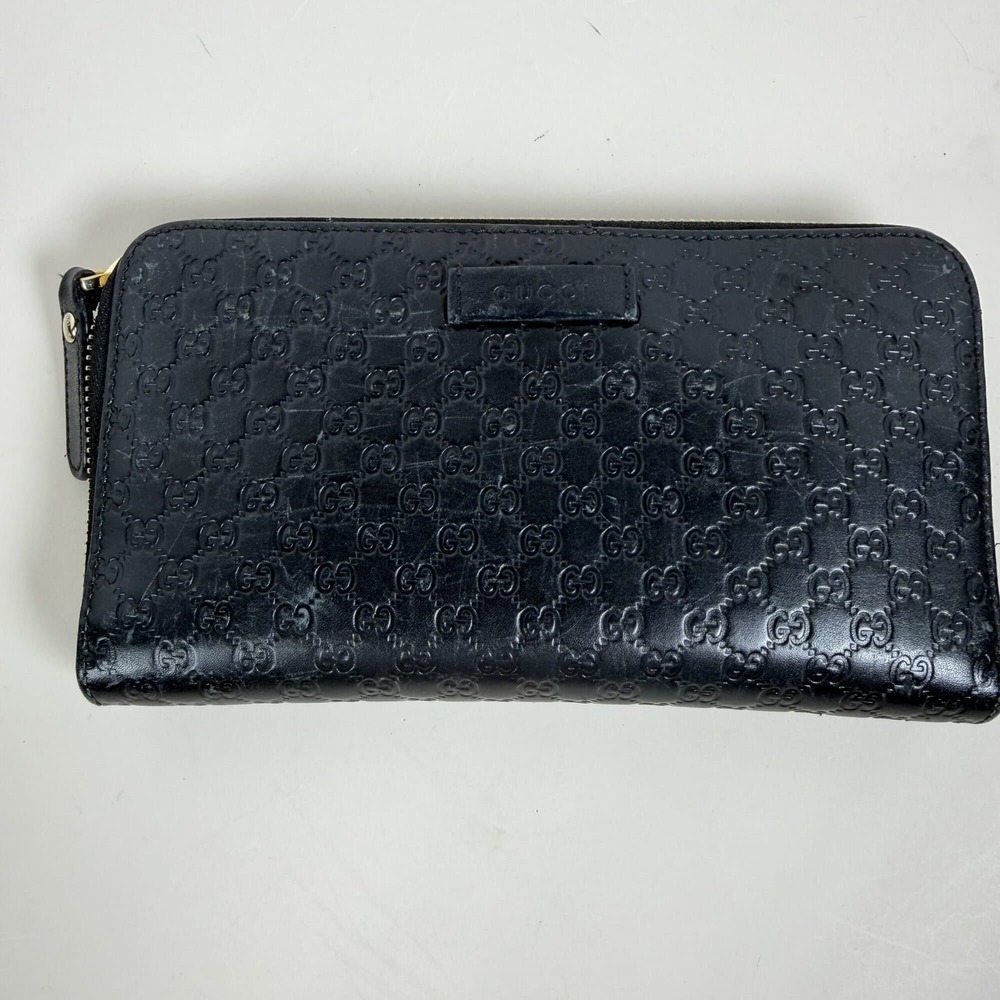 Gucci Black Microguccissima Leather Zip Around Wallet